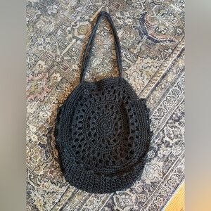 Black woven crochet shoulder bag